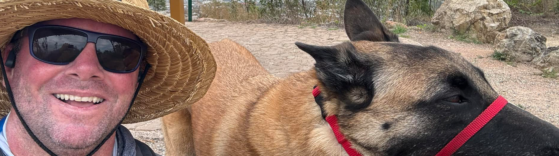 Veteran, Mate and fundraiser Garth sitting with his dog Max.